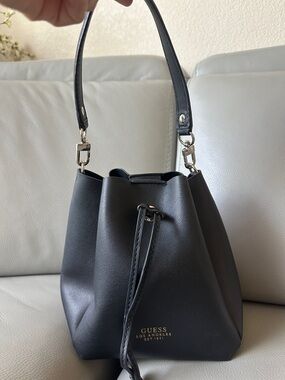 GUESS Black Mini Drawstring Bucket Bag with Gold Logo